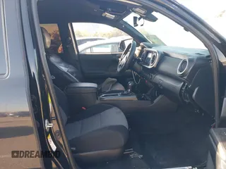 2019 Toyota Tacoma SR z VIN 5TFCZ5AN9KX199814, wystawiony jako IAAI lot #41841821 z przebiegiem 69 276 mil mil oraz . Historia ofert i sprzedaży dostępna na DreamBid. Obrazek 5.