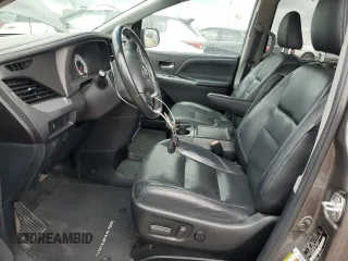 2016 Toyota Sienna SE with VIN 5TDXK3DCXGS732187, listed as a Copart auction lot 60566435 with Not provided miles and Clean title. Bid and sale history available at DreamBid. Image 7.