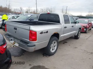 2007 Dodge Dakota SLT z VIN 1D7HW48K77S129162, wystawiony jako IAAI lot #41842077 z przebiegiem 186 172 mil mil oraz . Historia ofert i sprzedaży dostępna na DreamBid. Obrazek 4.