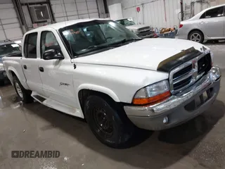 2001 Dodge Dakota z VIN 1B7HL2AX21S259774, wystawiony jako IAAI lot #41165907 z przebiegiem 311 576 mil mil oraz . Historia ofert i sprzedaży dostępna na DreamBid. Obrazek 1.