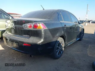 2017 Mitsubishi Lancer ES with VIN JA32U2FU3HU005652, listed as a IAAI auction lot 41478764 with 104,816 mi miles. Bid and sale history available at carsss.com. Image 4.
