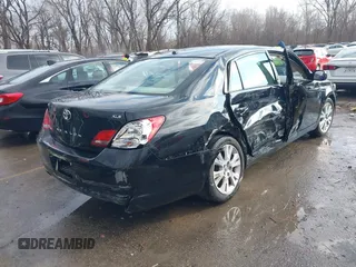2010 Toyota Avalon XL with VIN 4T1BK3DBXAU357773, listed as a IAAI auction lot 41228045 with 127,403 mi miles and . Bid and sale history available at carsss.com. Image 4.