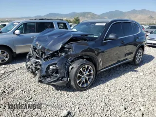2019 BMW X5 xDrive40i with VIN 5UXCR6C52KLL36780, listed as a Copart auction lot 61623995 with 35,756 mi miles and Salvage title. Bid and sale history available at DreamBid. Image 1.