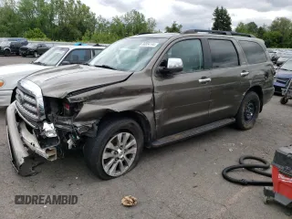 2014 Toyota Sequoia Limited with VIN 5TDJY5G15ES098519, listed as a Copart auction lot 60854144 with 0 mi miles and Salvage Title. Bid and sale history available at carsss.com. Image 1.