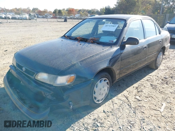 1997 Toyota Corolla with VIN 2T1BA02E0VC162383, listed as a IAAI auction lot 40715985 with 141,713 mi miles and . Bid and sale history available at DreamBid. Image 2.