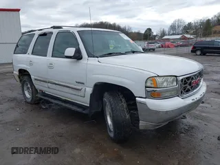 2002 GMC Yukon SLT with VIN 1GKEK13Z62J160529, listed as a IAAI auction lot 41730001 with 162,065 mi miles. Bid and sale history available at carsss.com. Image 1.