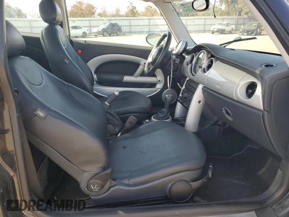 2004 MINI Hardtop with VIN WMWRC33464TJ62893, listed as a Copart auction lot 51905565 with 141,958 mi miles and Salvage Title. Bid and sale history available at DreamBid. Image 10.