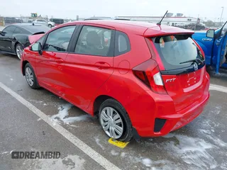 2016 Honda Fit LX with VIN JHMGK5H59GS008911, listed as a IAAI auction lot 42002981 with 96,224 mi miles and . Bid and sale history available at DreamBid. Image 3.