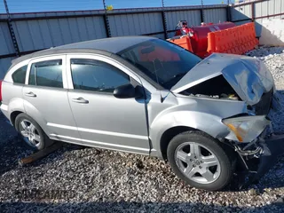 2009 Dodge Caliber SXT with VIN 1B3HB48A99D143067, listed as a IAAI auction lot 40989643 with 132,534 mi miles and . Bid and sale history available at carsss.com. Image 14.