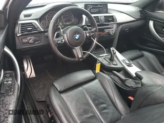 2014 BMW 4 Series 435i xDrive with VIN WBA3R5C50EK187272, listed as a Copart auction lot 56579855 with 129,873 mi miles and Salvage title. Bid and sale history available at DreamBid. Image 8.
