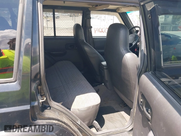 1999 Jeep Cherokee Sport with VIN 1J4FF68S0XL509171, listed as a IAAI auction lot 42402214 with Not provided miles and . Bid and sale history available at DreamBid. Image 8.