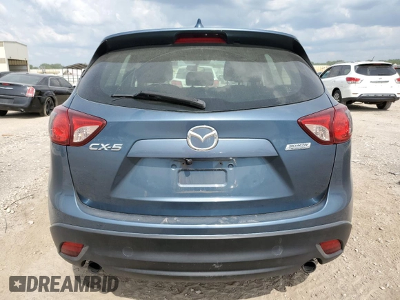 2015 Mazda CX-5 Sport z VIN JM3KE2BE8F0434116, wystawiony jako Copart lot #60712625 z przebiegiem 300 405 mil mil oraz Szkoda całkowita • Salvage title. Historia ofert i sprzedaży dostępna na DreamBid. Obrazek 6.