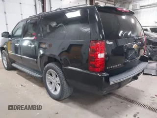 2012 Chevrolet Suburban LTZ with VIN 1GNSKKE77CR326924, listed as a IAAI auction lot 41764487 with 198,224 mi miles. Bid and sale history available at carsss.com. Image 3.