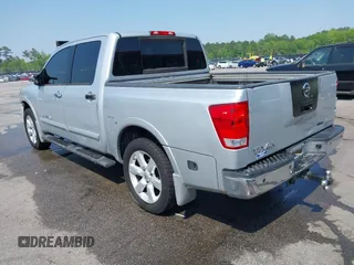 2010 Nissan Titan SE with VIN 1N6BA0ED3AN324773, listed as a IAAI auction lot 41982313 with 270,002 mi miles. Bid and sale history available at carsss.com. Image 3.
