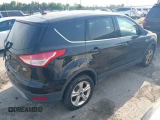2013 Ford Escape SE with VIN 1FMCU9GX1DUC40662, listed as a IAAI auction lot 42158818 with 115,953 mi miles and . Bid and sale history available at DreamBid. Image 4.