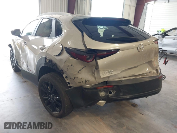 2024 Mazda CX-30 S Select Sport with VIN 3MVDMBBM0RM698491, listed as a IAAI auction lot 42609161 with 21,576 mi miles and . Bid and sale history available at DreamBid. Image 3.