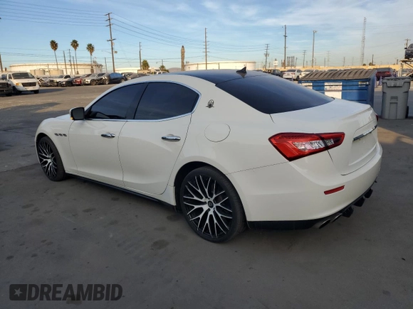 2014 Maserati Ghibli z VIN ZAM57XSA6E1097525, wystawiony jako Copart lot #42029695 z przebiegiem 93 740 mil mil oraz Szkoda całkowita • Salvage title. Historia ofert i sprzedaży dostępna na DreamBid. Obrazek 2.