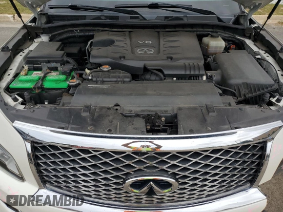 2016 Infiniti QX80 with VIN JN8AZ2NCXG9401865, listed as a Copart auction lot 70574004 with 111,335 mi miles and Salvage Title. Bid and sale history available at DreamBid. Image 12.