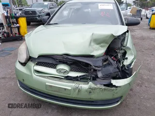 2008 Hyundai Accent GS with VIN KMHCM36C48U073067, listed as a IAAI auction lot 42055217 with 173,949 mi miles. Bid and sale history available at carsss.com. Image 6.