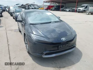 2024 Toyota Prius LE with VIN JTDACAAU7R3040428, listed as a IAAI auction lot 42123897 with 2,572 mi miles. Bid and sale history available at carsss.com. Image 1.