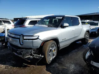 2023 Rivian R1T Adventure with VIN 7FCTGAAA5PN017311, listed as a Copart auction lot 42523755 with 35,039 mi miles and Salvage Title. Bid and sale history available at carsss.com. Image 1.