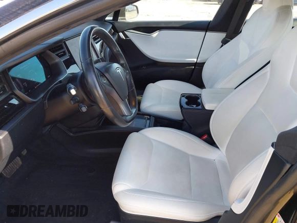2020 Tesla Model S Long Range with VIN 5YJSA1E23LF381872, listed as a IAAI auction lot 41763046 with 96,720 mi miles and . Bid and sale history available at DreamBid. Image 24.