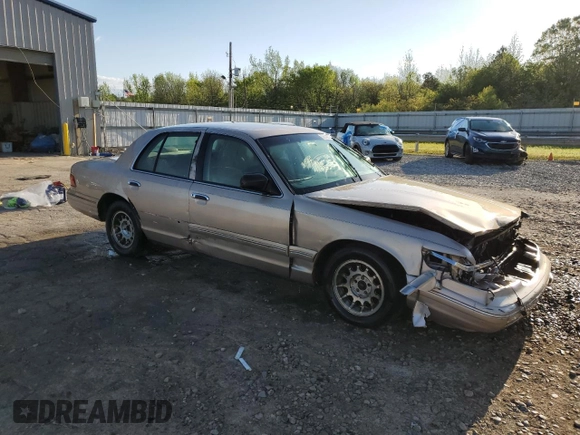 1997 Mercury Grand Marquis LS with VIN 2MELM75W3VX692074, listed as a Copart auction lot 52542335 with 211,850 mi miles and Salvage Title. Bid and sale history available at DreamBid. Image 4.