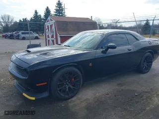 2019 Dodge Challenger R/T Scat Pack with VIN 2C3CDZFJ4KH618527, listed as a IAAI auction lot 41842986 with 106,389 mi miles. Bid and sale history available at carsss.com. Image 2.