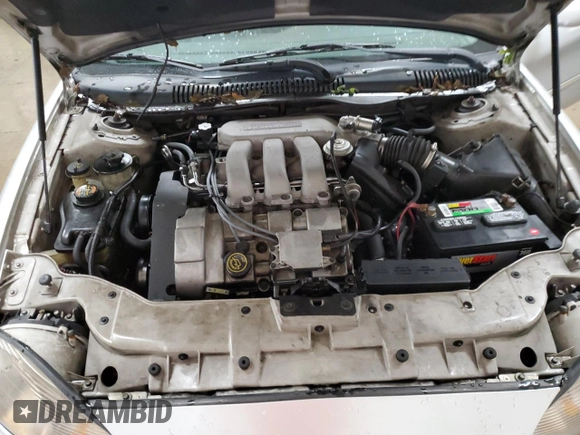 1999 Mercury Sable with VIN 1MEFM58S6XA647250, listed as a Copart auction lot 83479674 with 166,550 mi miles and Salvage title. Bid and sale history available at DreamBid. Image 11.