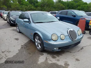 2003 Jaguar S-Type with VIN SAJEA01U33HM70079, listed as a IAAI auction lot 41939388 with 147,975 mi miles and . Bid and sale history available at DreamBid. Image 6.