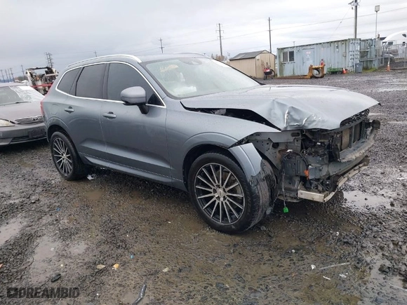 2018 Volvo XC60 Momentum with VIN YV4A22RK3J1093832, listed as a IAAI auction lot 40917553 with 115,056 mi miles. Bid and sale history available at carsss.com. Image 1.