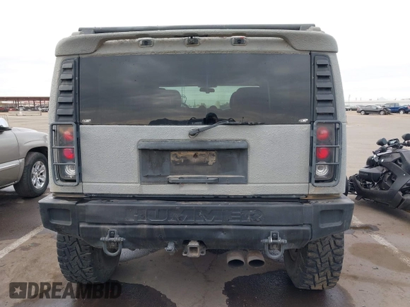 2003 Hummer H2 with VIN 5GRGN23U13H128617, listed as a IAAI auction lot 41494349 with 135,295 mi miles. Bid and sale history available at carsss.com. Image 16.