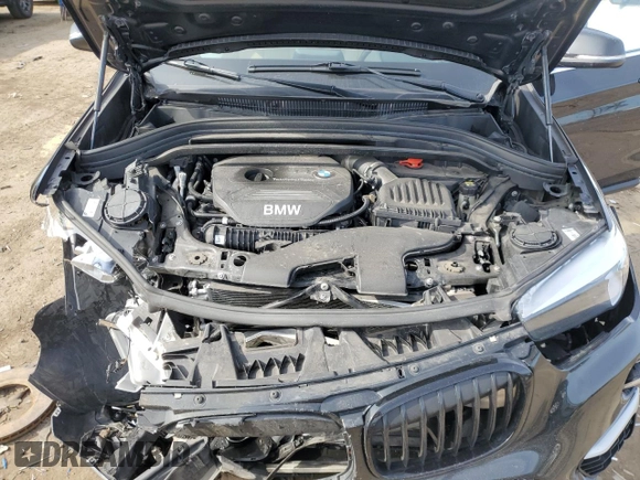2018 BMW X1 xDrive28i with VIN WBXHT3C31J5K25021, listed as a Copart auction lot 48779555 with 71,741 mi miles and Salvage Title. Bid and sale history available at carsss.com. Image 12.