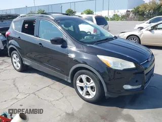 2013 Ford Escape SE with VIN 1FMCU0GX3DUB70805, listed as a IAAI auction lot 42735924 with 164,628 mi miles and . Bid and sale history available at DreamBid. Image 1.