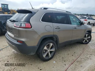 2019 Jeep Cherokee Limited with VIN 1C4PJLDNXKD160045, listed as a Copart auction lot 66154223 with 54,820 mi miles and . Bid and sale history available at DreamBid. Image 3.