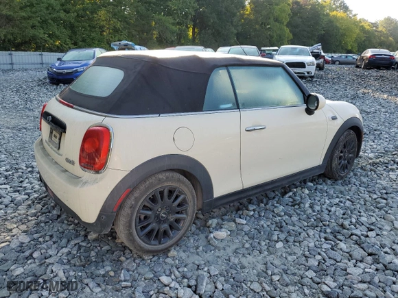 2016 MINI Cooper Convertible with VIN WMWWG5C56G3C18883, listed as a Copart auction lot 70001434 with 57,985 mi miles and Salvage Title. Bid and sale history available at carsss.com. Image 3.
