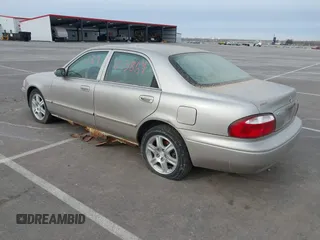 2002 Mazda 626 LX with VIN 1YVGF22DX25263864, listed as a IAAI auction lot 41846129 with 282,516 mi miles. Bid and sale history available at carsss.com. Image 3.