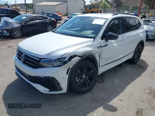 2023 Volkswagen Tiguan SE R-Line Black z VIN 3VVCB7AX3PM115373, wystawiony jako IAAI lot #42257944 z przebiegiem 22 316 mil mil oraz . Historia ofert i sprzedaży dostępna na DreamBid. Obrazek 19.