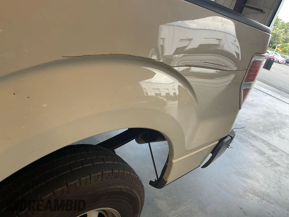 2013 Ford F-150 XL with VIN 1FTMF1CM3DKD43237, listed as a IAAI auction lot 42636389 with 164,975 mi miles and . Bid and sale history available at DreamBid. Image 15.