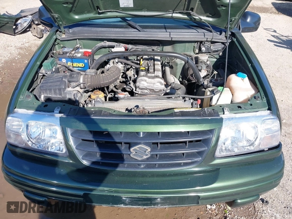 2001 Suzuki Vitara JX z VIN 2S3TD52V416109787, wystawiony jako IAAI lot #42126699 z przebiegiem Nie podano mil oraz . Historia ofert i sprzedaży dostępna na DreamBid. Obrazek 10.
