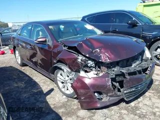2014 Toyota Avalon Limited with VIN 4T1BK1EBXEU128924, listed as a IAAI auction lot 41720917 with 199,423 mi miles. Bid and sale history available at carsss.com. Image 1.