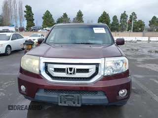 2009 Honda Pilot Touring with VIN 5FNYF48959B007813, listed as a IAAI auction lot 41823645 with 200,571 mi miles and . Bid and sale history available at carsss.com. Image 12.