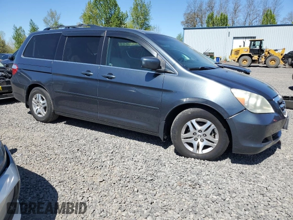 2005 Honda Odyssey EX with VIN 5FNRL38415B009502, listed as a Copart auction lot 53872455 with 205,051 mi miles and Salvage title. Bid and sale history available at DreamBid. Image 4.