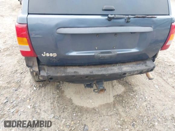 2002 Jeep Grand Cherokee Laredo z VIN 1J4GX48S62C201579, wystawiony jako IAAI lot #42102238 z przebiegiem 262 630 mil mil oraz . Historia ofert i sprzedaży dostępna na DreamBid. Obrazek 6.