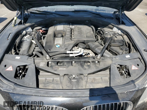 2012 BMW 7 Series 740i with VIN WBAKA4C59CDS99437, listed as a Copart auction lot 73795104 with 120,199 mi miles and Clean Title. Bid and sale history available at carsss.com. Image 11.