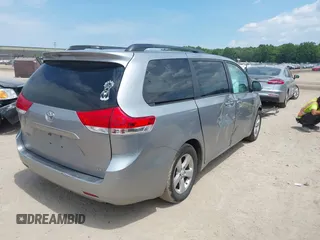 2011 Toyota Sienna LE AAS with VIN 5TDKK3DCXBS156328, listed as a IAAI auction lot 42721542 with 153,286 mi miles and . Bid and sale history available at DreamBid. Image 4.