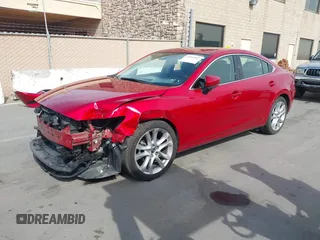 2017 Mazda Mazda6 Touring with VIN JM1GL1V56H1155982, listed as a IAAI auction lot 42055447 with 59,566 mi miles. Bid and sale history available at carsss.com. Image 2.
