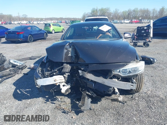 2014 BMW 4 Series 428i with VIN WBA3V7C59EJ872576, listed as a IAAI auction lot 41997699 with Not provided miles and . Bid and sale history available at DreamBid. Image 13.