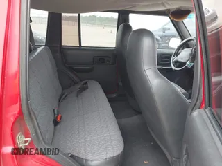 2001 Jeep Cherokee Sport with VIN 1J4FT48S01L537833, listed as a IAAI auction lot 41943255 with 239,473 mi miles. Bid and sale history available at carsss.com. Image 8.