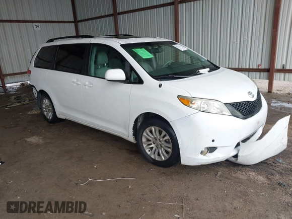 2014 Toyota Sienna XLE with VIN 5TDYK3DC6ES444121, listed as a IAAI auction lot 42110190 with 240,366 mi miles and . Bid and sale history available at DreamBid. Image 1.